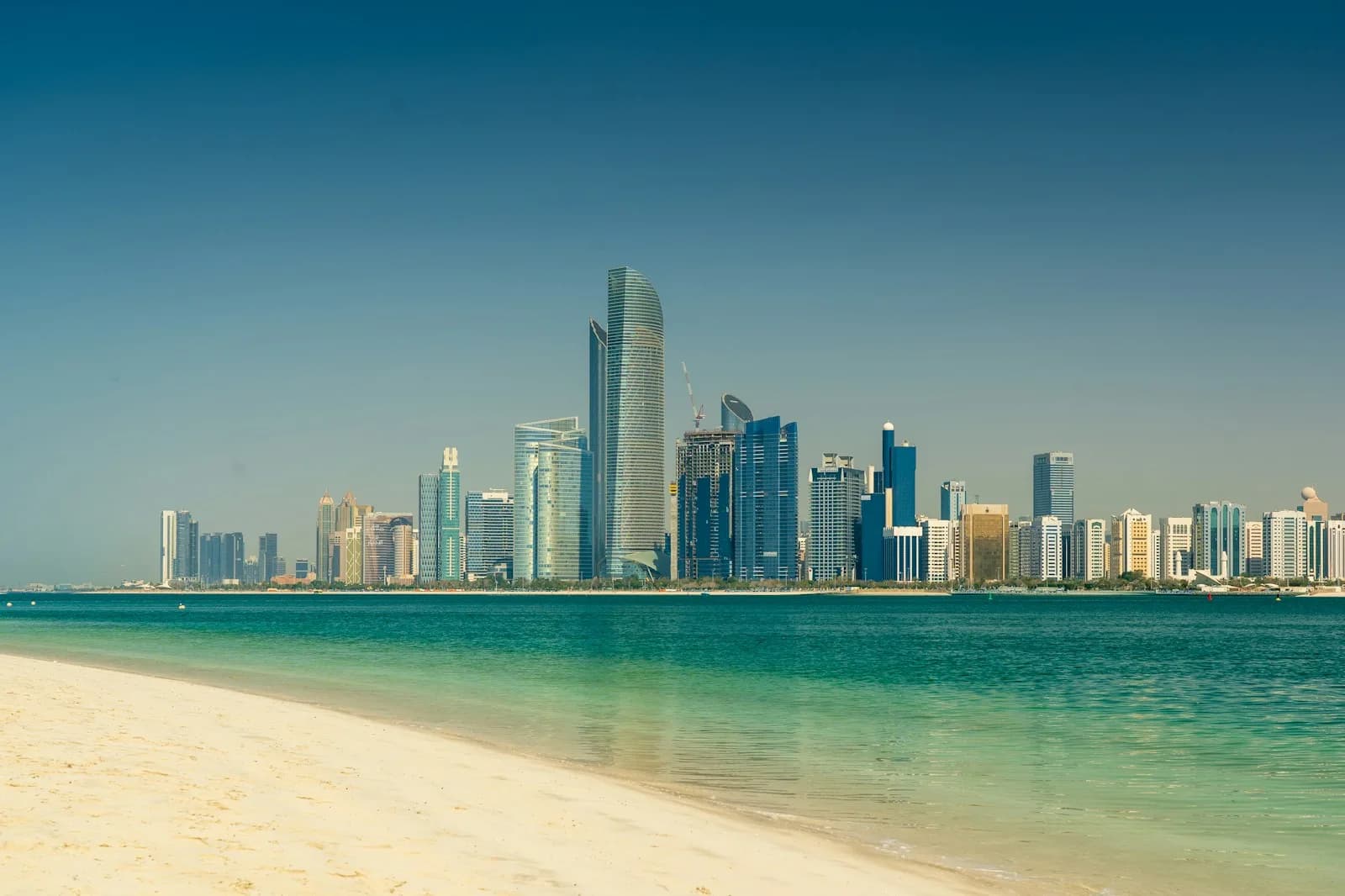 Abu Dhabi Corniche skyline across the water